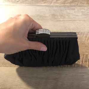 Black clutch with diamond embellishments.